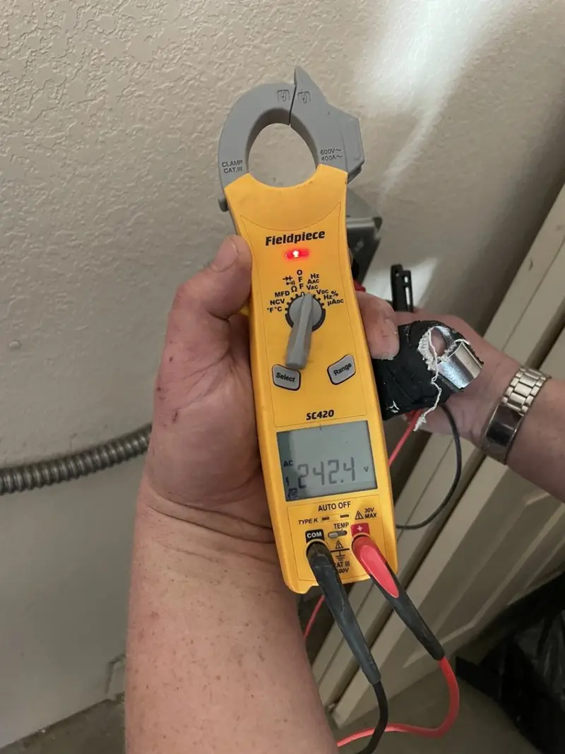 Voltage testing with clamp meter during Circuit Breaker Repair in East Hampton